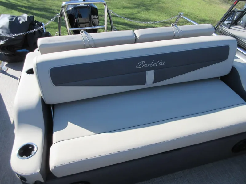 Slide: The Image of 2022 Barletta Cabrio 22UC boat seat with cup holders, featuring elegant design and comfortable upholstery. - 11