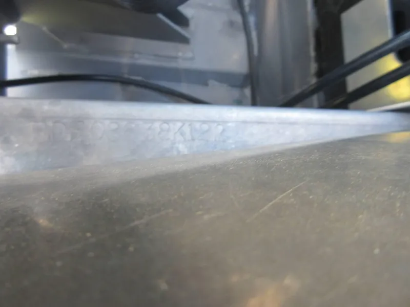 Slide: The Image of Close-up of a metal surface on a 2022 Barletta Cabrio 22UC boat. - 17