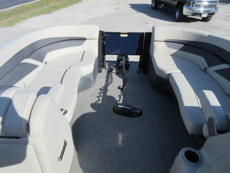 Slide: The Image of 2022 Barletta Cabrio 22UC pontoon boat interior with spacious seating and modern design. - 18