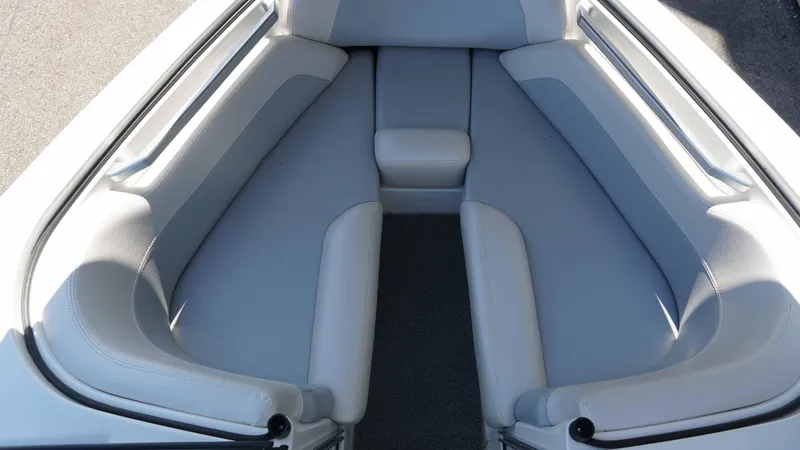 Slide: The Image of 2017 MasterCraft ProStar boat interior with gray seating and sleek design. - 11