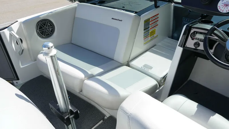 Slide: The Image of 2017 MasterCraft ProStar interior with white seating and steering wheel. - 6