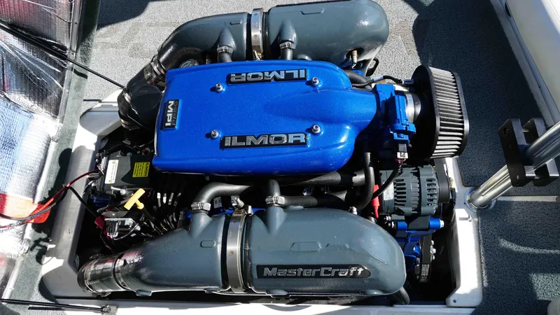 Slide: The Image of 2017 MasterCraft ProStar engine with blue Ilmor cover, showcasing performance components. - 8