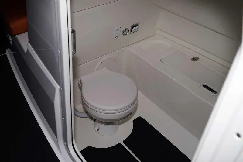 Slide: The Image of 2026 Brig Eagle 8 boat interior with compact marine toilet. - 3