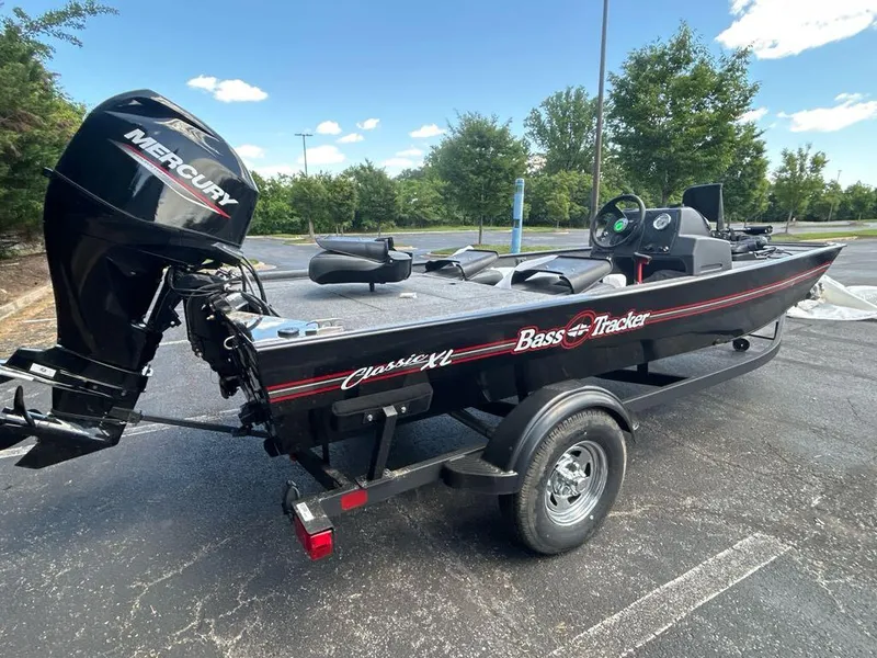 Slide: The Image of 2025 Tracker Bass Tracker Classic XL boat with Mercury engine on trailer. - 3