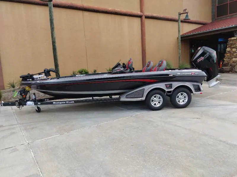 The Image of 2025 Ranger Z520 boat on trailer, parked outdoors, showcasing sleek design and modern features. - 0