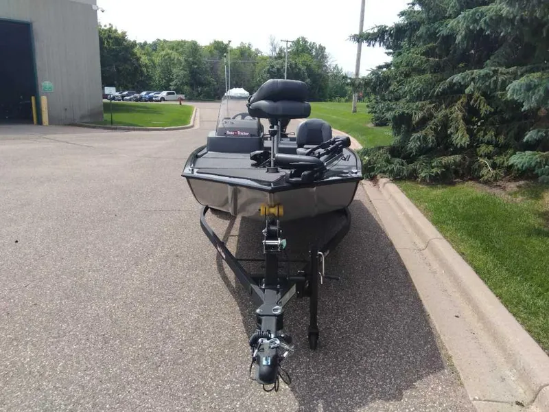 Slide: The Image of 2025 Tracker Bass Tracker Classic XL boat on trailer, parked outdoors. - 3