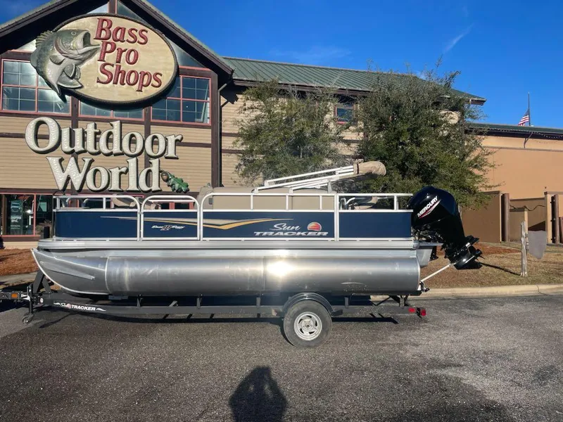 Slide: The Image of 2025 Sun Tracker Bass Buggy 18 DLX pontoon boat at Bass Pro Shops Outdoor World. - 5