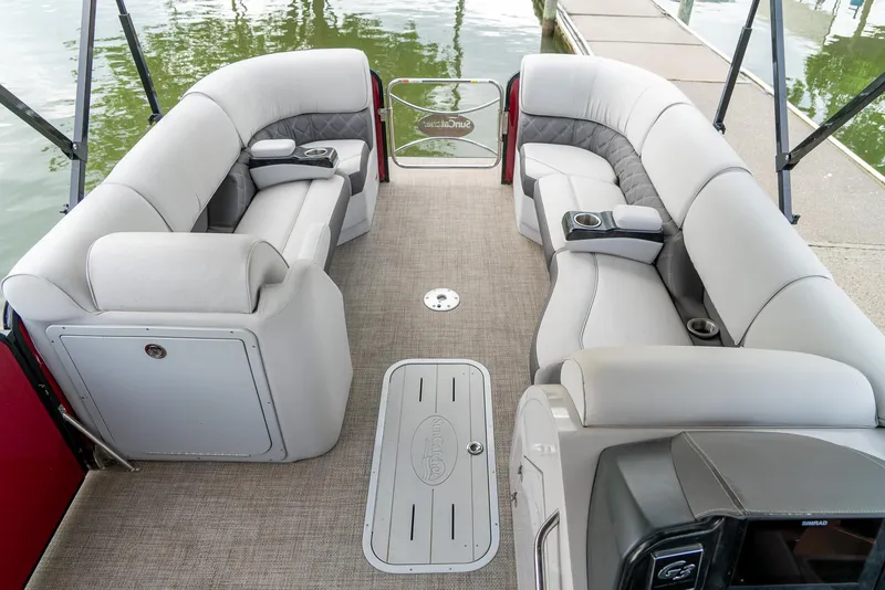 Slide: The Image of 2021 G3 SunCatcher Elite 326 Cruise pontoon boat interior with plush seating and cup holders. - 15