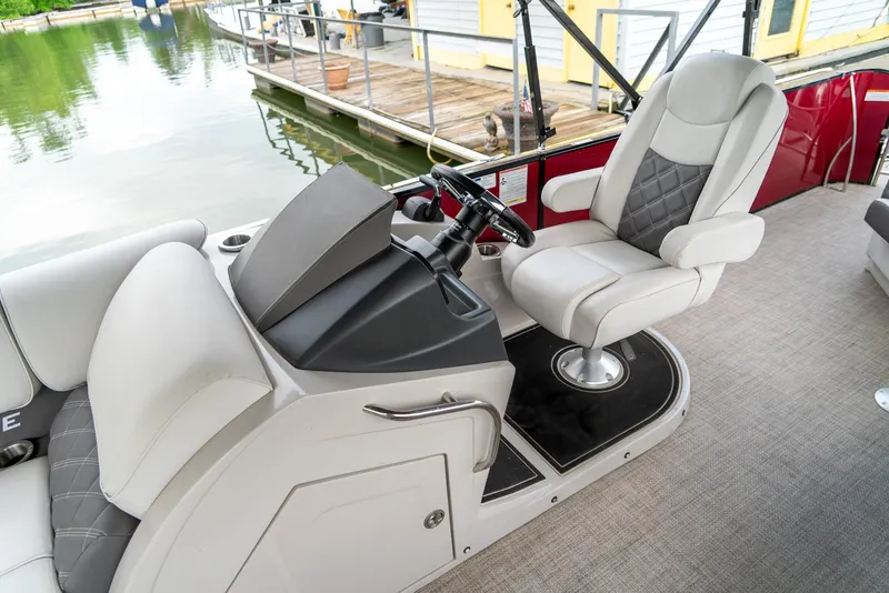 Slide: The Image of Luxurious 2021 G3 SunCatcher Elite 326 Cruise boat interior with plush seating and modern helm. - 22