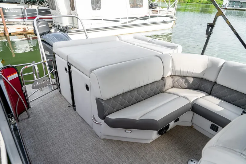 Slide: The Image of 2021 G3 SunCatcher Elite 326 Cruise boat interior with plush seating and modern design. - 24