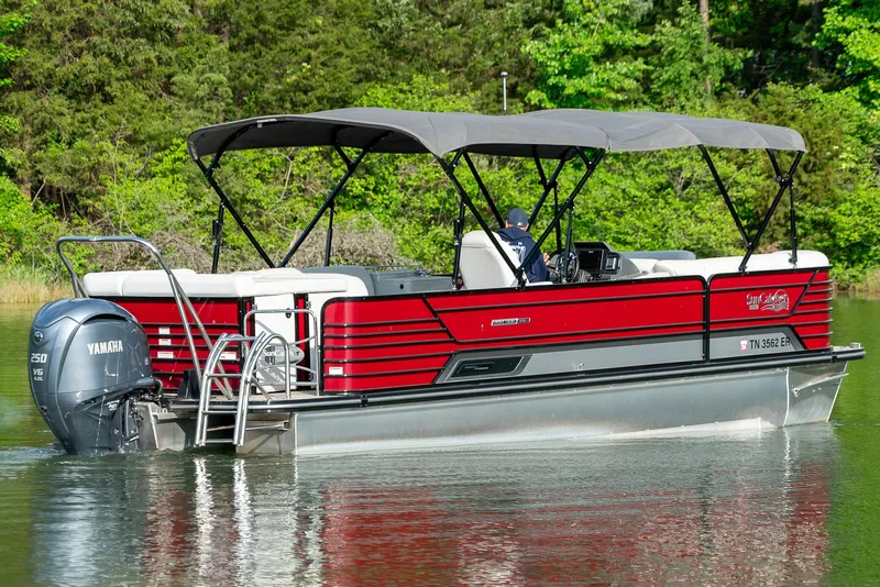 Slide: The Image of 2021 G3 SunCatcher Elite 326 Cruise pontoon boat on a calm lake. - 5