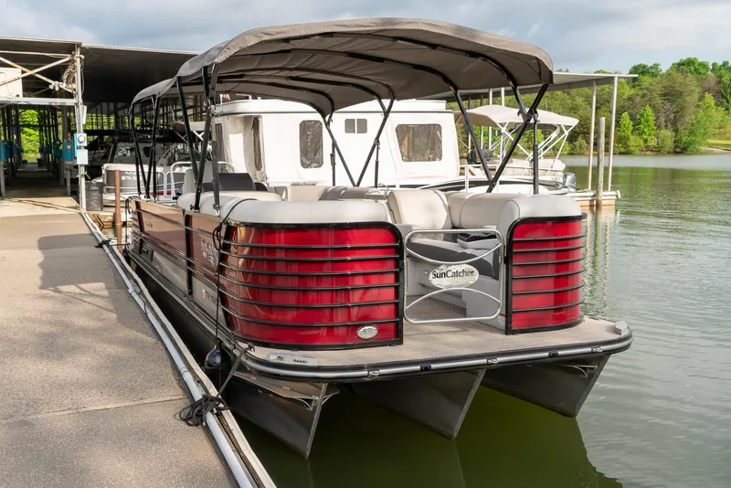Slide: The Image of 2021 G3 SunCatcher Elite 326 Cruise pontoon boat docked at marina. - 6
