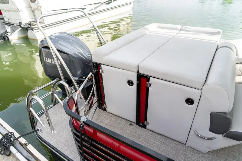 Slide: The Image of 2021 G3 SunCatcher Elite 326 Cruise pontoon boat with Yamaha motor, docked on calm water. - 8