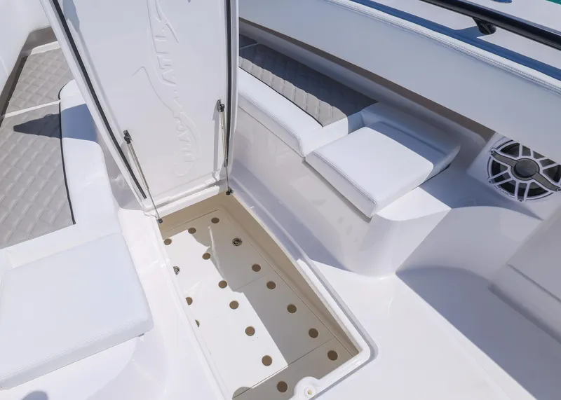 Slide: The Image of 2025 Blackwater 43 Sportfish boat interior with seating and storage compartment. - 13