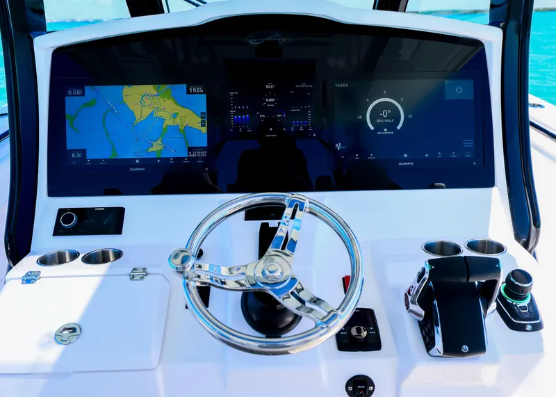 Slide: The Image of Helm of 2025 Blackwater 43 Sportfish with advanced navigation displays and controls. - 18