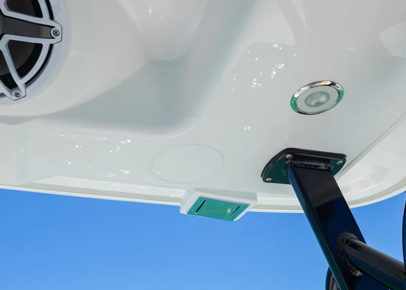 Slide: The Image of 2025 Blackwater 43 Sportfish boat detail with speaker and light against blue sky. - 21