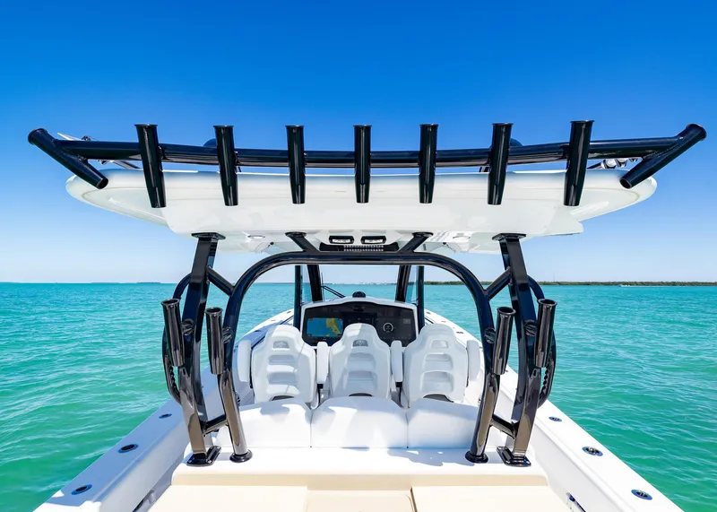 Slide: The Image of 2025 Blackwater 43 Sportfish boat on turquoise water under clear blue sky. - 33