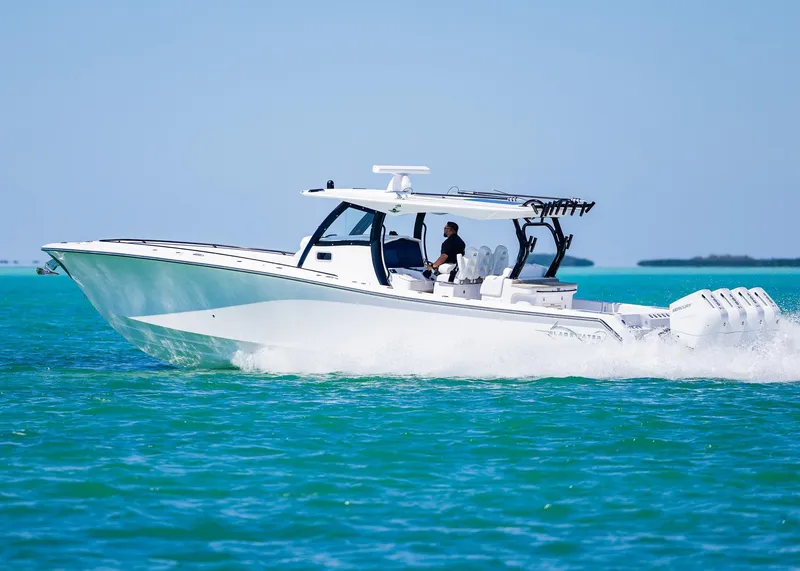 Slide: The Image of 2025 Blackwater 43 Sportfish boat cruising on turquoise waters. - 4