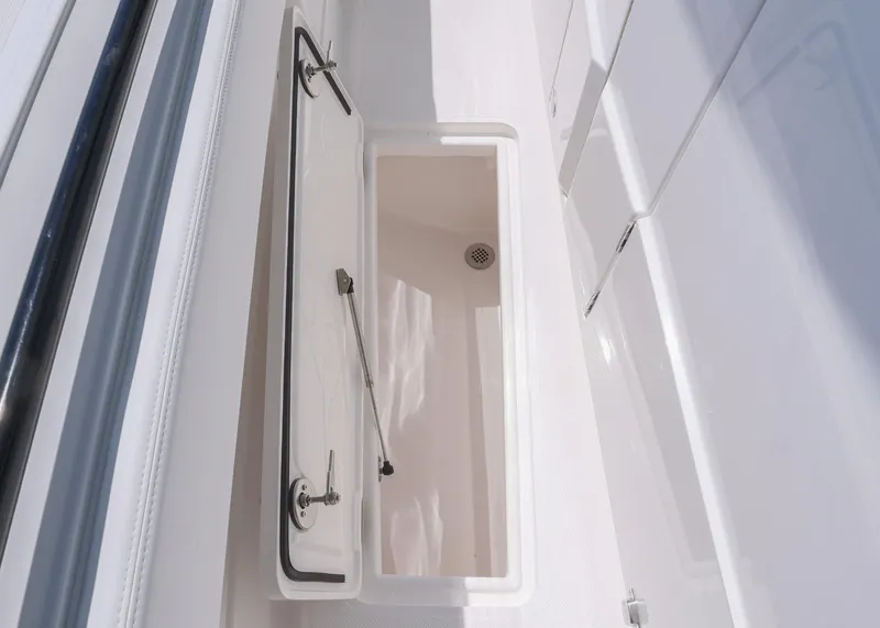 Slide: The Image of Open storage compartment on 2025 Blackwater 43 Sportfish boat, showcasing sleek design. - 46