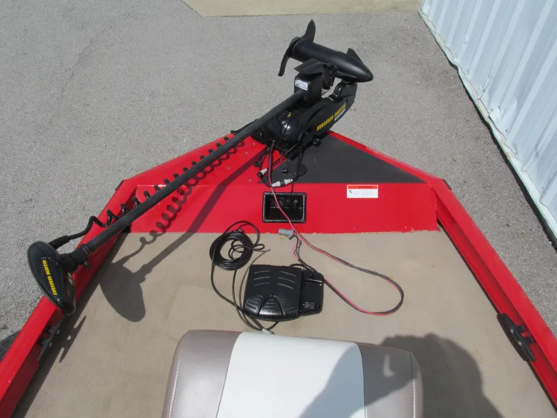 Slide: The Image of 2006 Lowe Stinger 160 boat with trolling motor and control panel. - 9