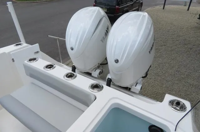 Slide: The Image of KenCraft 25 Offshore 2025 boat with dual Yamaha outboard engines. - 15