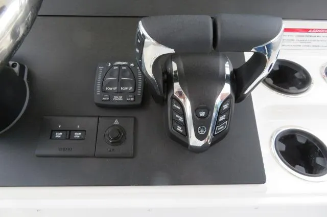 Slide: The Image of Control panel of 2025 KenCraft 25 Offshore boat with modern throttle and switches. - 27