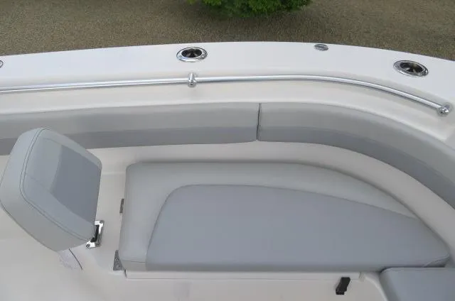 Slide: The Image of KenCraft 25 Offshore 2025 boat interior with cushioned seating and stainless steel rail. - 38