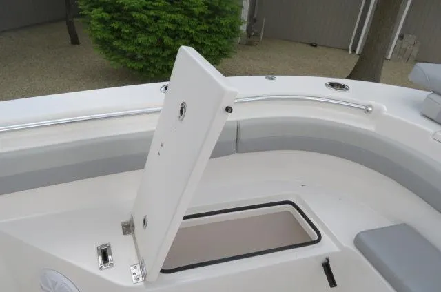 Slide: The Image of 2025 KenCraft 25 Offshore boat with open storage compartment on deck. - 40