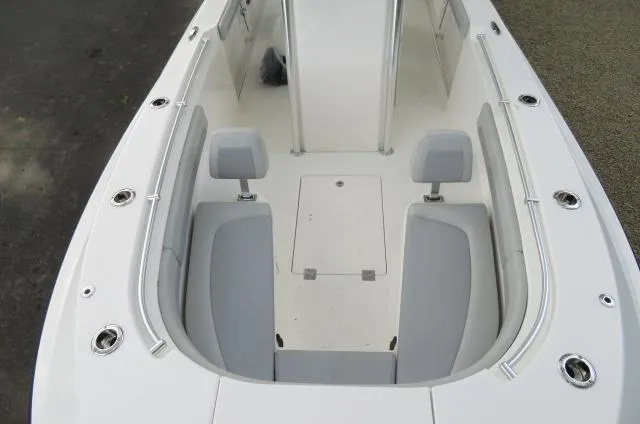 Slide: The Image of KenCraft 25 Offshore 2025 boat interior with seating and storage compartments. - 43