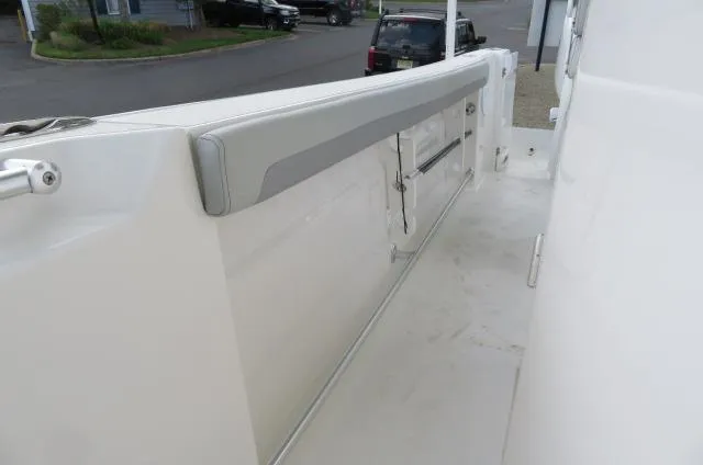 Slide: The Image of 2025 KenCraft 25 Offshore boat deck with cushioned side panel. - 45