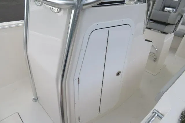 Slide: The Image of KenCraft 25 Offshore 2025 boat interior with storage compartment and seating. - 47