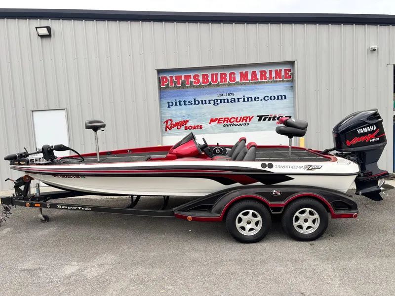 Slide: The Image of 2005 Ranger Z20 Comanche boat on trailer at Pittsburg Marine dealership. - 0