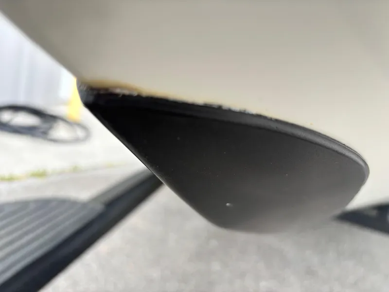 Slide: The Image of Close-up of a 2005 Ranger Z20 Comanche boat hull detail. - 2