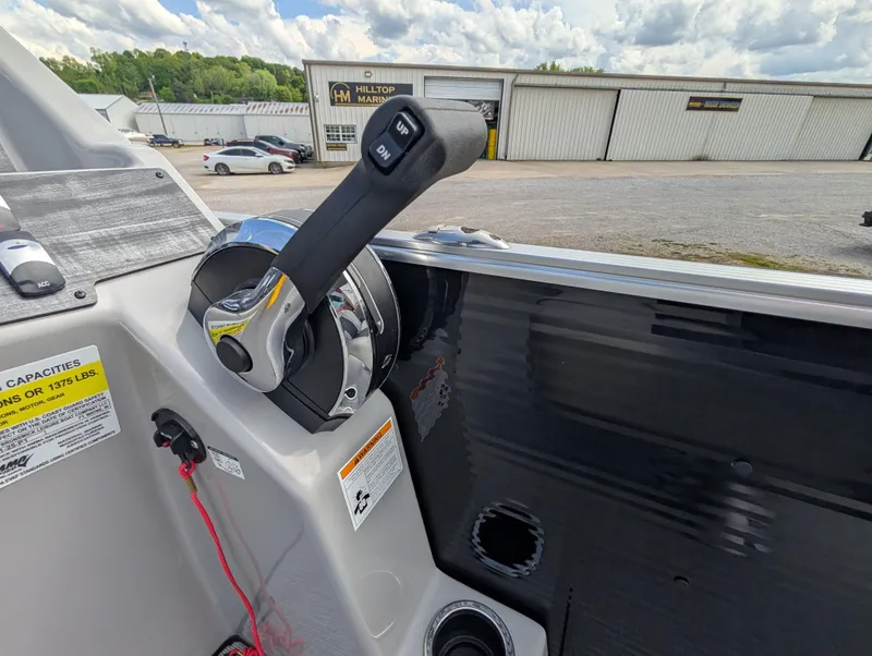 Slide: The Image of Harris Cruiser 210 boat throttle control, 2022 model, at Hilltop Marine dealership. - 15