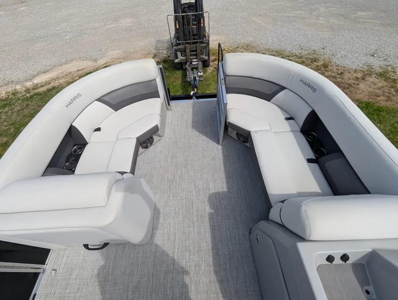 Slide: The Image of 2022 Harris Cruiser 210 boat interior with spacious seating and modern design. - 22