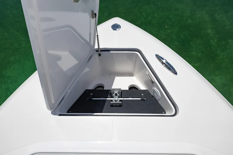 Slide: The Image of 2024 Blackwater 43 Sportfish boat anchor compartment open on deck. - 8