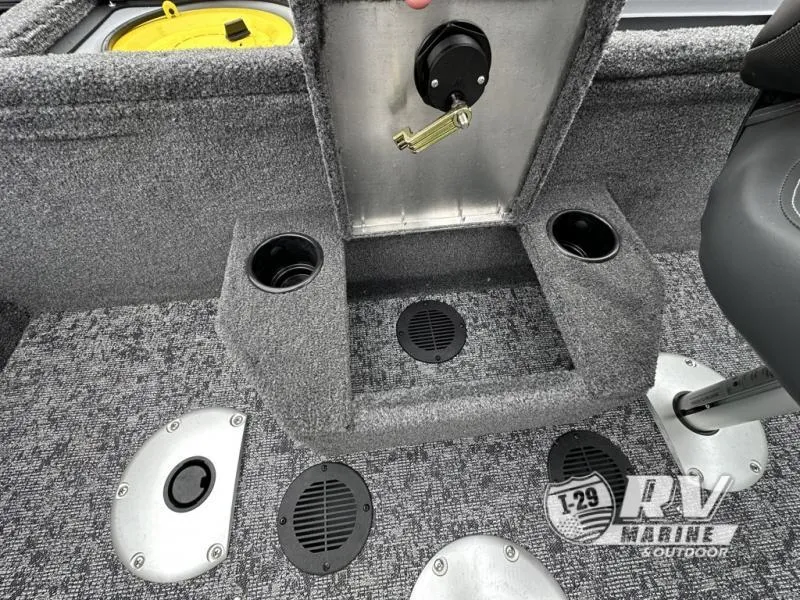 Slide: The Image of 2025 Tracker Pro Guide V-175 WT boat interior with cup holders and storage compartments. - 14