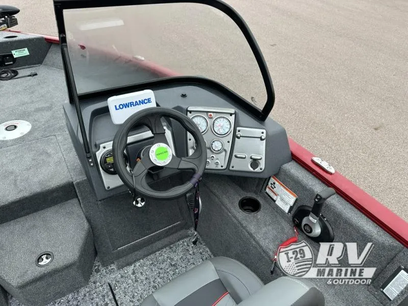 Slide: The Image of 2025 Tracker Pro Guide V-175 WT boat dashboard with steering wheel and control panel. - 18