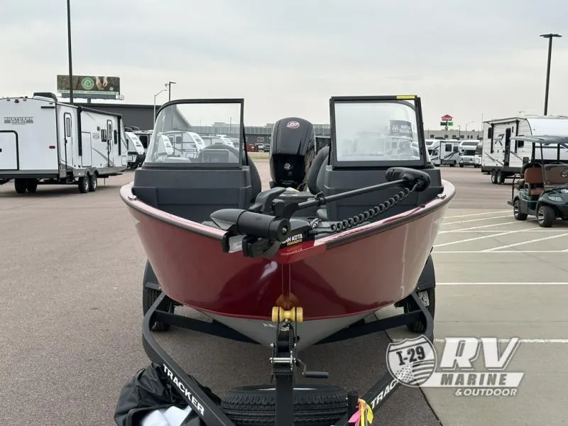 Slide: The Image of 2025 Tracker Pro Guide V-175 WT boat on trailer at RV Marine dealership. - 5