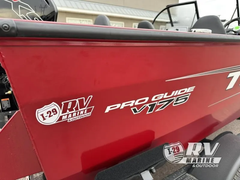 Slide: The Image of 2025 Tracker Pro Guide V-175 WT boat, red exterior, I-29 RV Marine branding. - 8