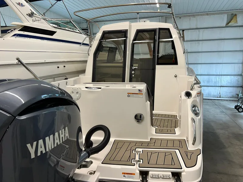 Slide: The Image of 2022 Cutwater C-24 Coupe with Yamaha engine in a storage facility. - 16