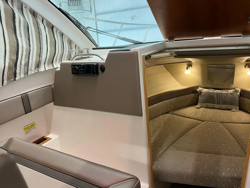 Slide: The Image of 2022 Cutwater C-24 Coupe interior with cozy cabin and modern design. - 26