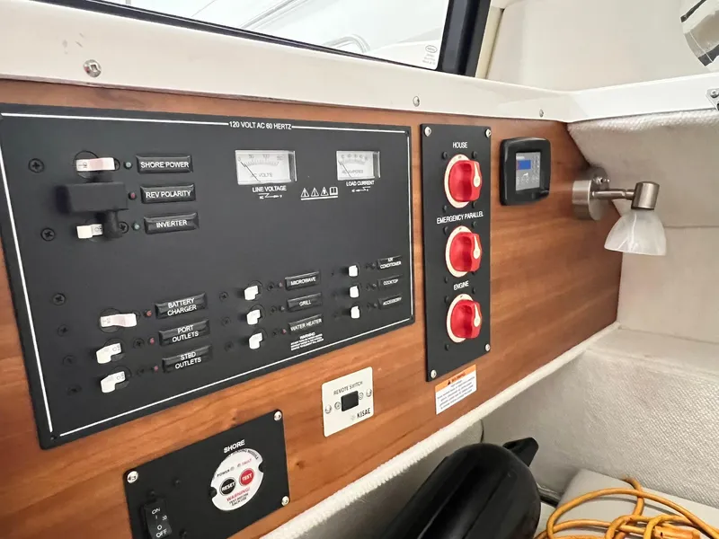 Slide: The Image of Electrical control panel inside a 2022 Cutwater C-24 Coupe boat. - 30