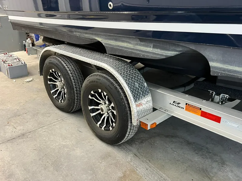 Slide: The Image of Trailer with dual wheels for 2022 Cutwater C-24 Coupe boat. - 38