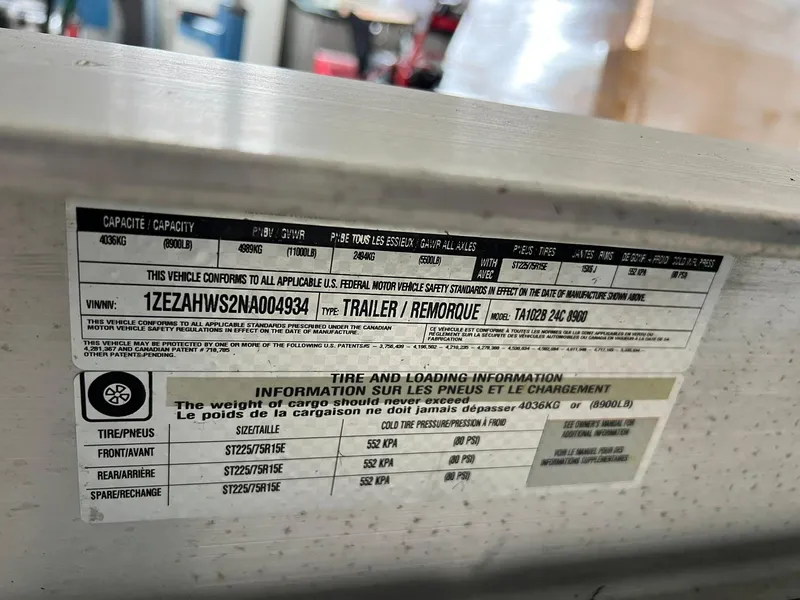 Slide: The Image of Label on 2022 Cutwater C-24 Coupe trailer with tire and loading information. - 40