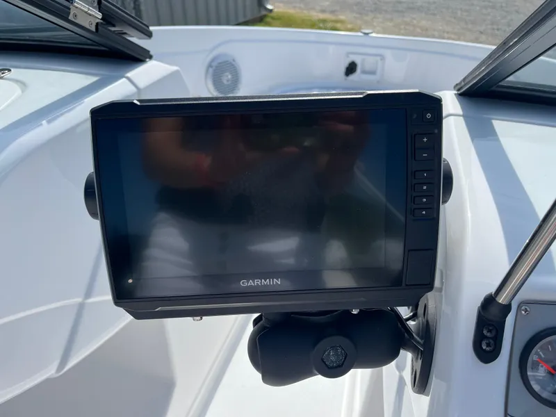 Slide: The Image of Garmin navigation system on 2023 Tahoe 185 S boat dashboard. - 5