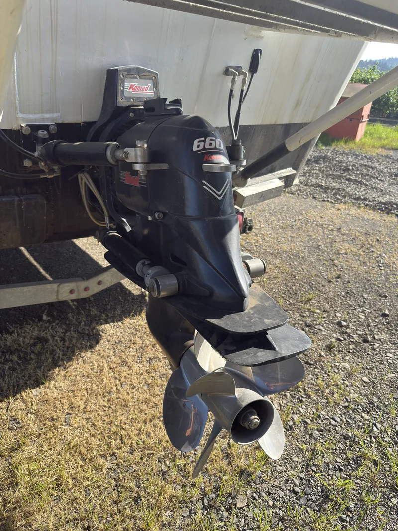 Slide: The Image of Outboard motor of a 1975 Monark 30 Fishing Boat on a trailer. - 32