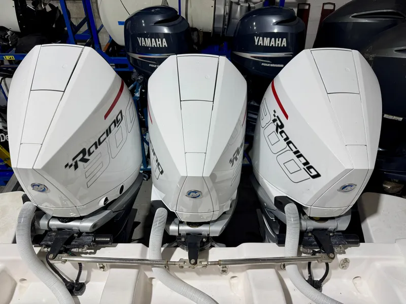 Slide: The Image of Triple Mercury Racing 300 outboard engines on a 2020 Intrepid 407 Nomad FE boat. - 17