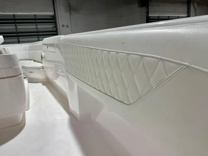 Slide: The Image of 2020 Intrepid 407 Nomad FE interior with white quilted upholstery detail. - 24