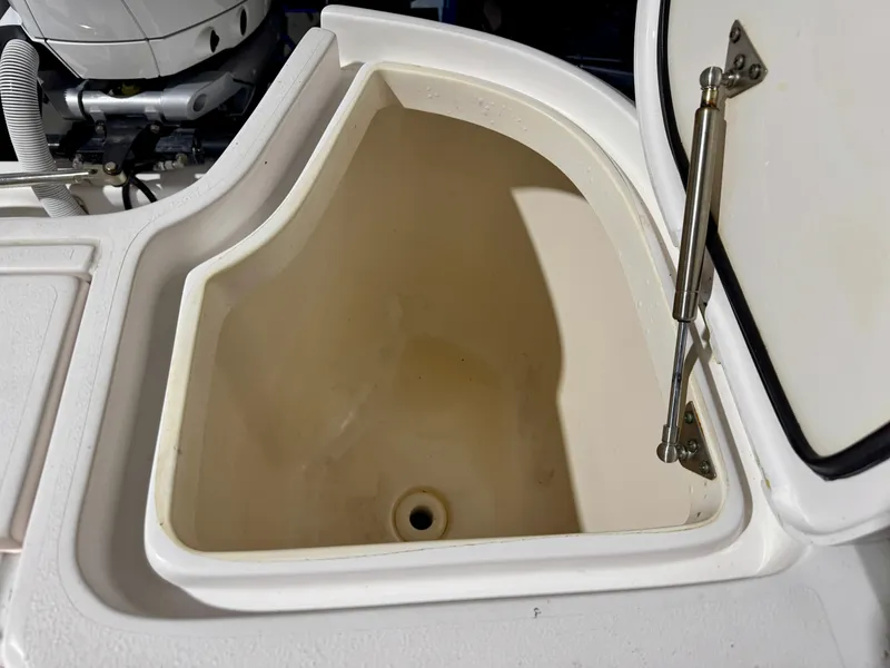 Slide: The Image of Open storage compartment on a 2020 Intrepid 407 Nomad FE boat. - 25